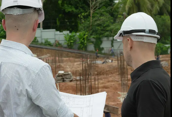 two people discussing a solar installation project