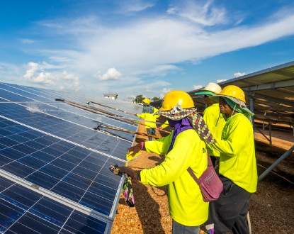 thai construction team installing solar project